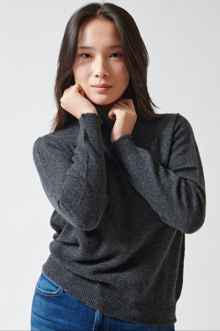 Lilly wearing Jumper 1234 Cashmere Distressed Roll Collar front view