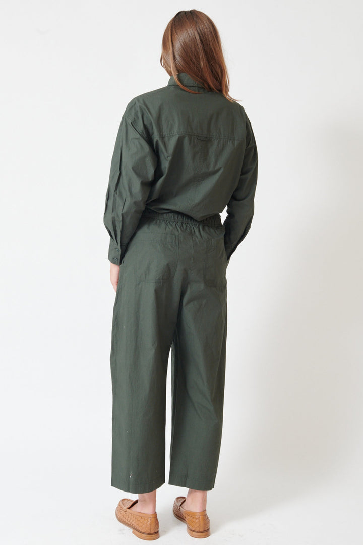 Julia wearing Apiece Apart Spa Pleat Pant rear view
