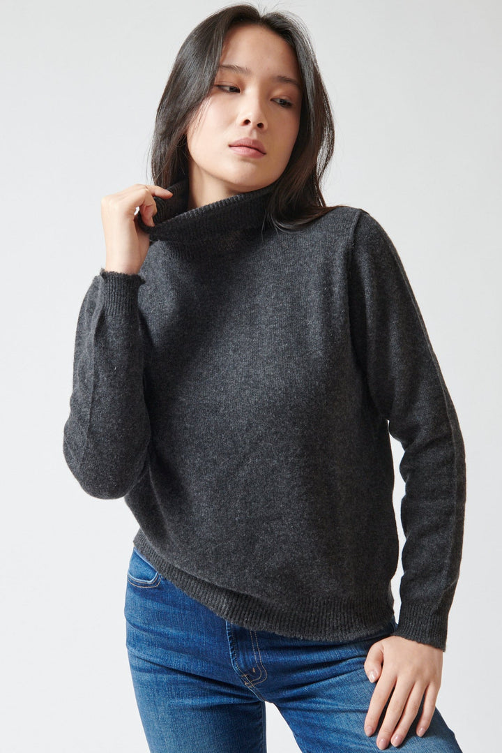 Lilly wearing Jumper 1234 Cashmere Distressed Roll Collar front view