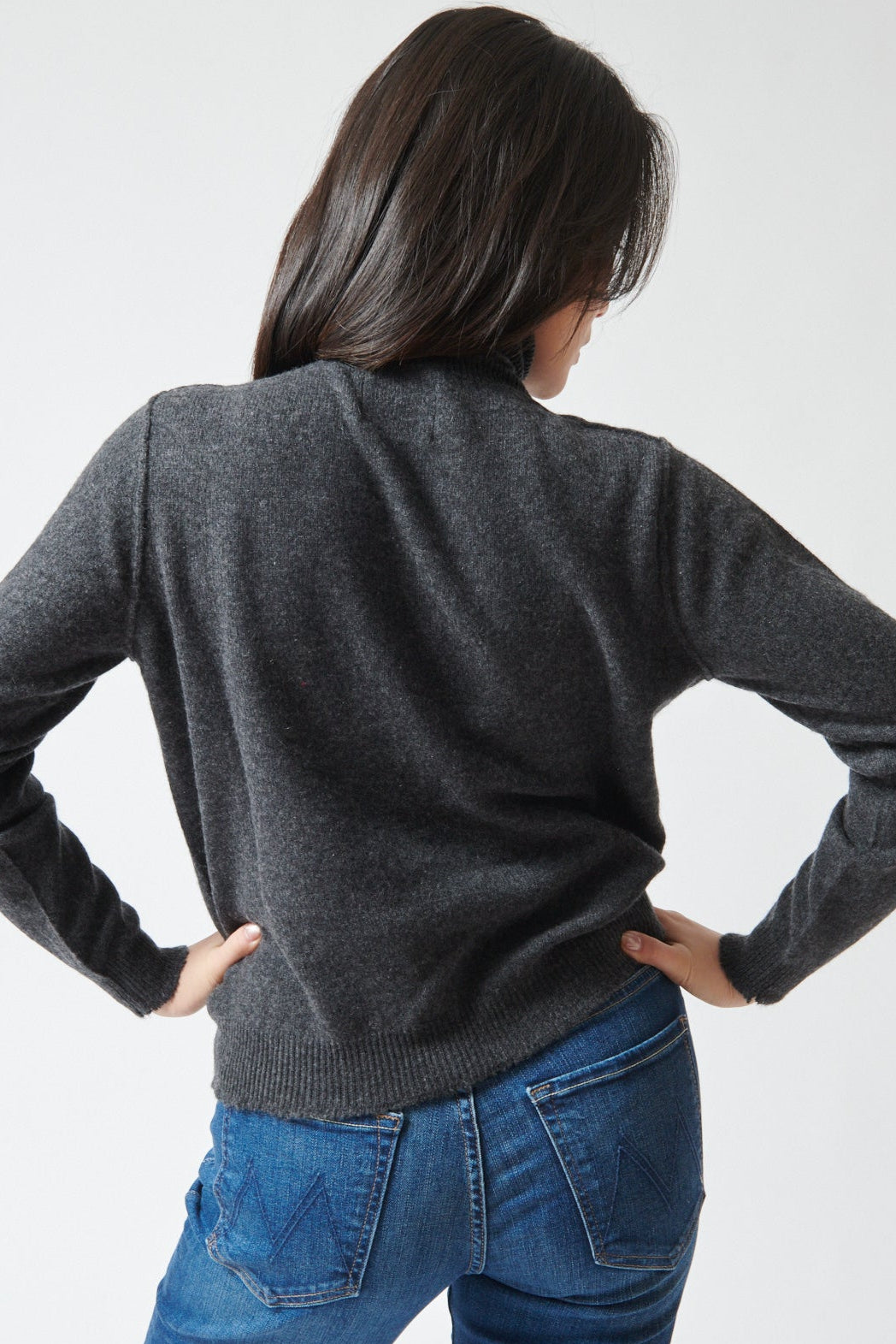 Lilly wearing Jumper 1234 Cashmere Distressed Roll Collar rear view