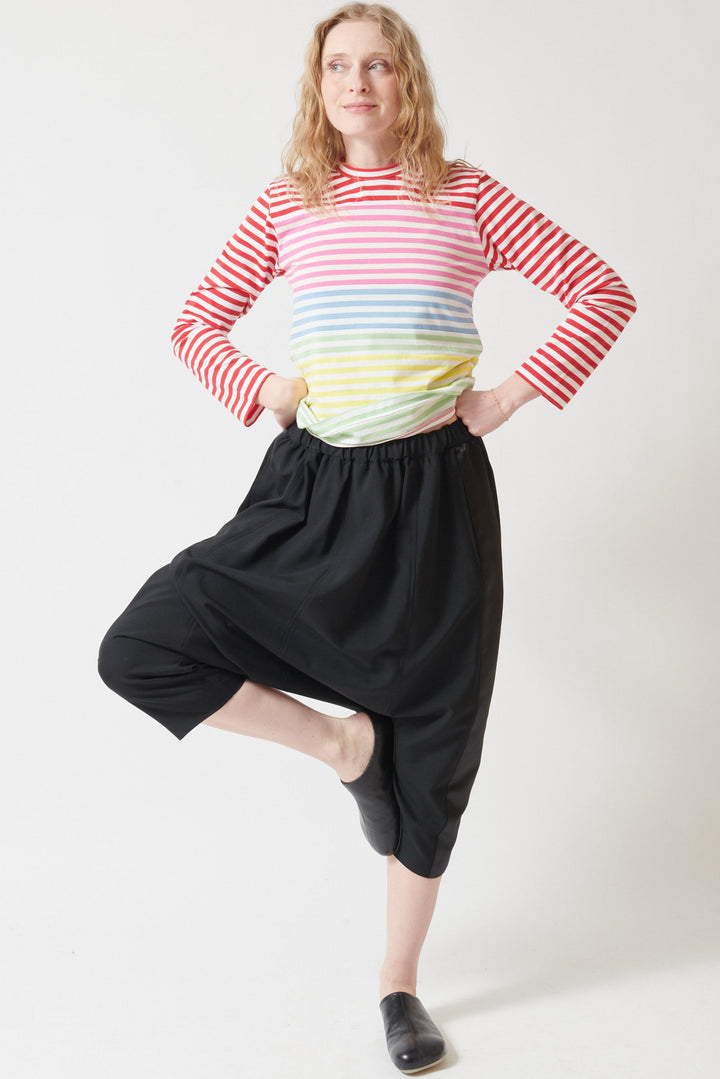 Madi wearing Comme des Garçons Drop Crotch Tuxedo Pant front view