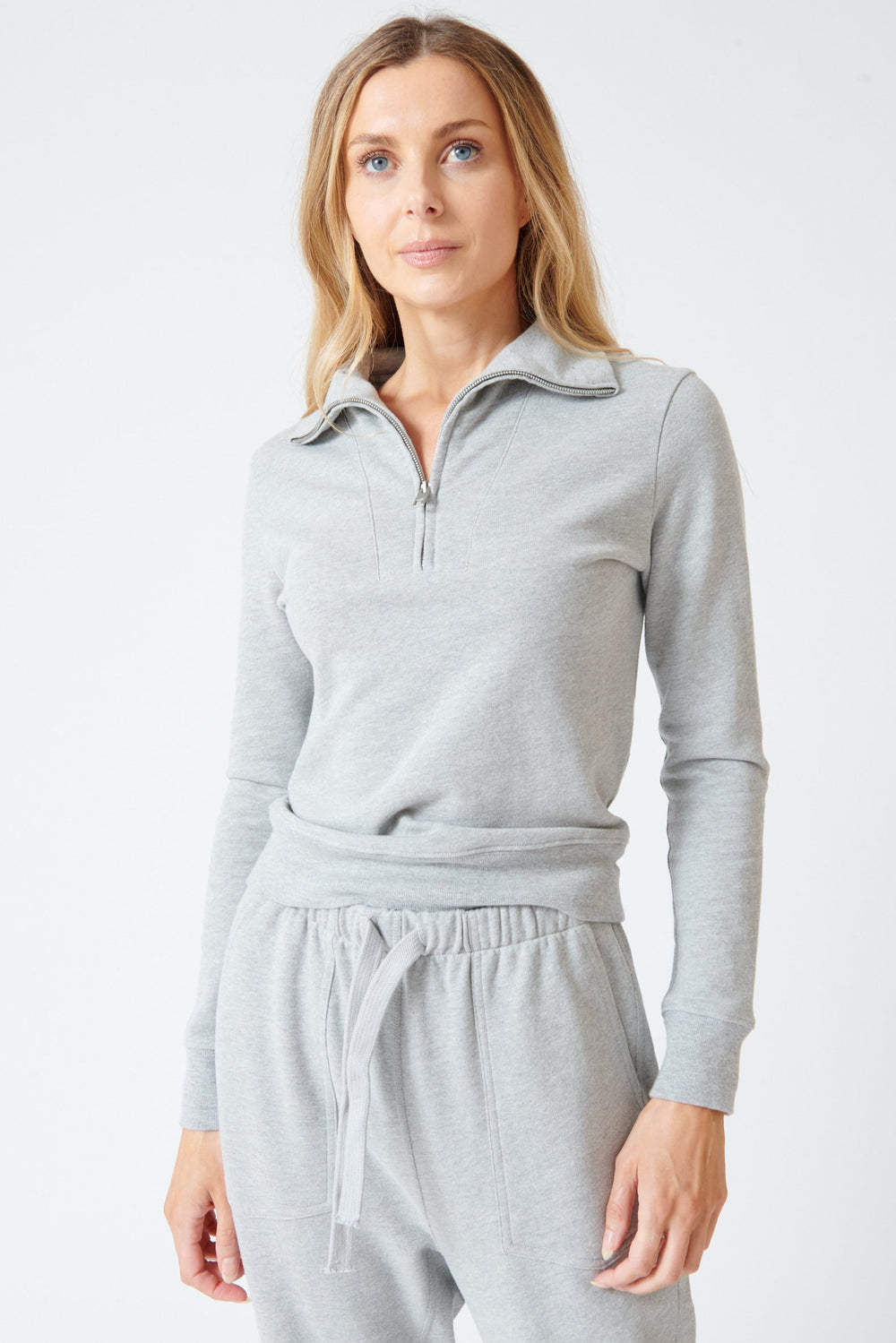 Mari wearing Nili Lotan Diya Quarter Zip Sweatshirt front view