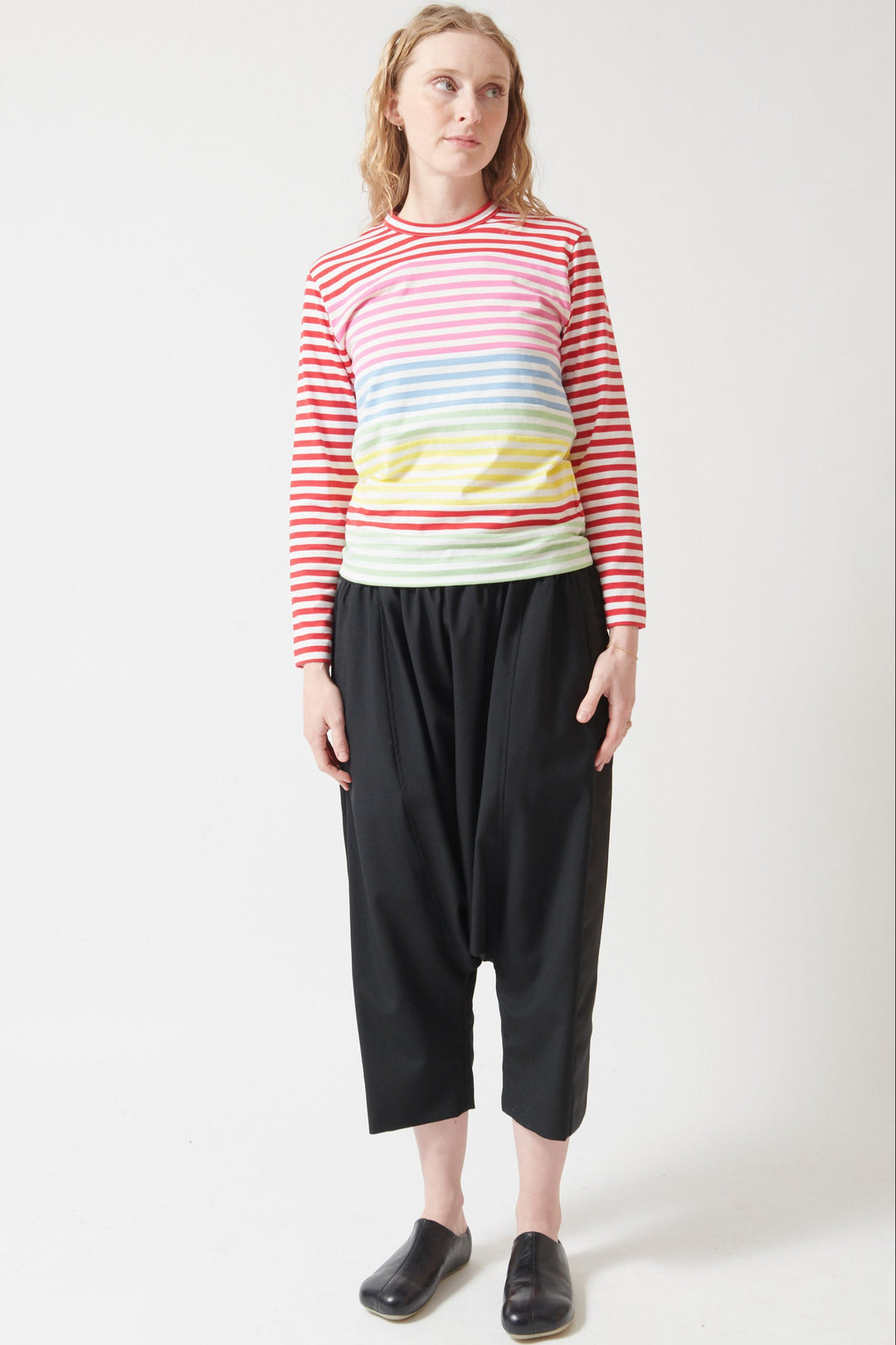 Madi wearing Comme des Garçons Drop Crotch Tuxedo Pant front view