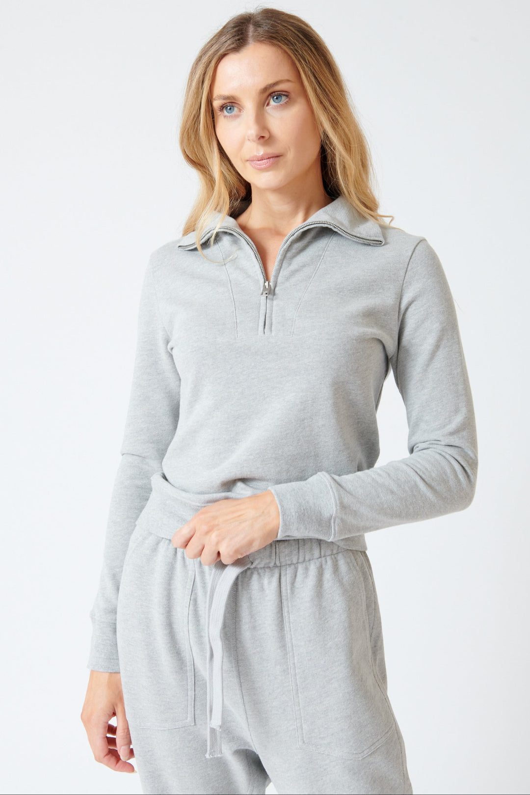 Mari wearing Nili Lotan Diya Quarter Zip Sweatshirt front view