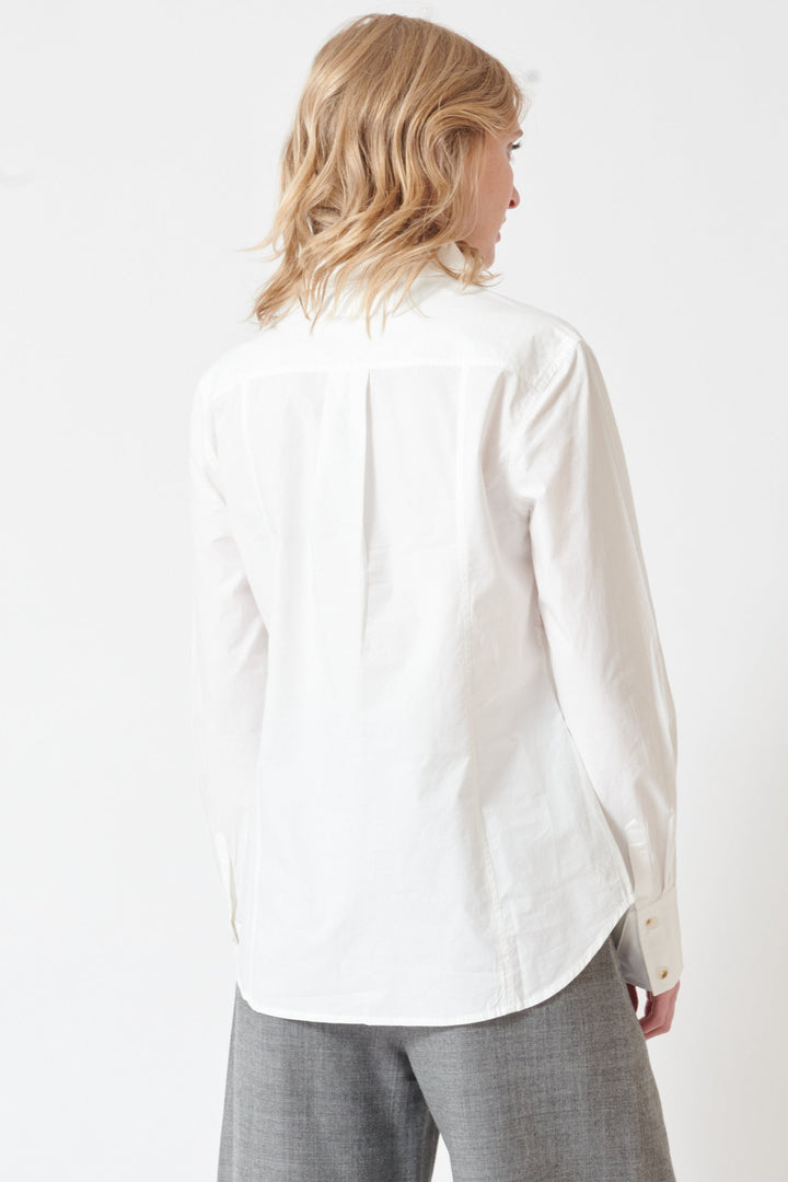 Madi wearing Apiece Apart Amine Fitted Shirt rear view