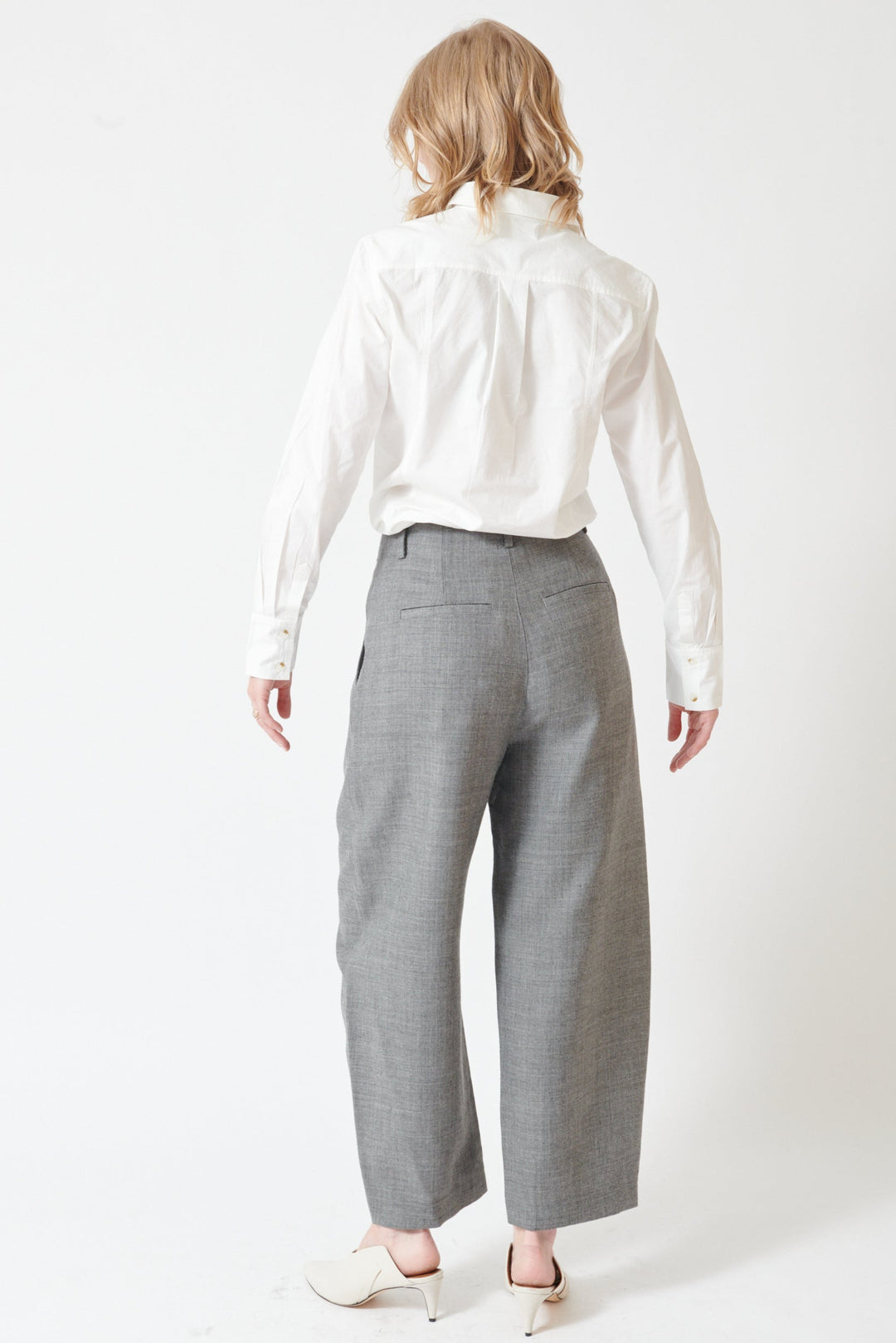 Madi wearing Apiece Apart Bari Crop Trouser rear view