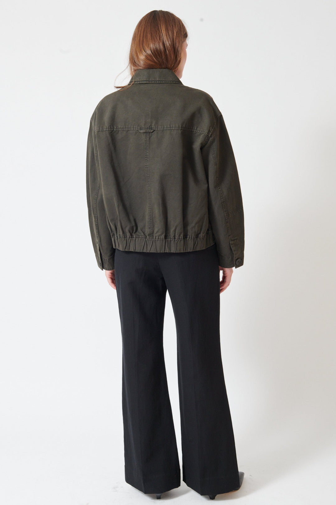 Julia wearing Apiece Apart Adi Wide Leg Trouser rear view