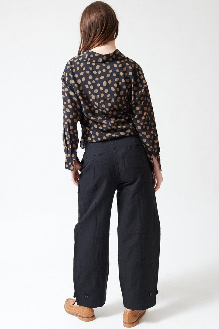 Sophie wearing Apiece Apart Juna Cargo Pant rear view