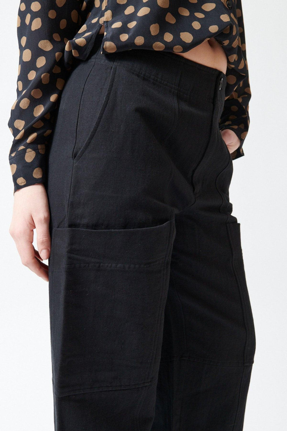 Sophie wearing Apiece Apart Juna Cargo Pant side/detail view