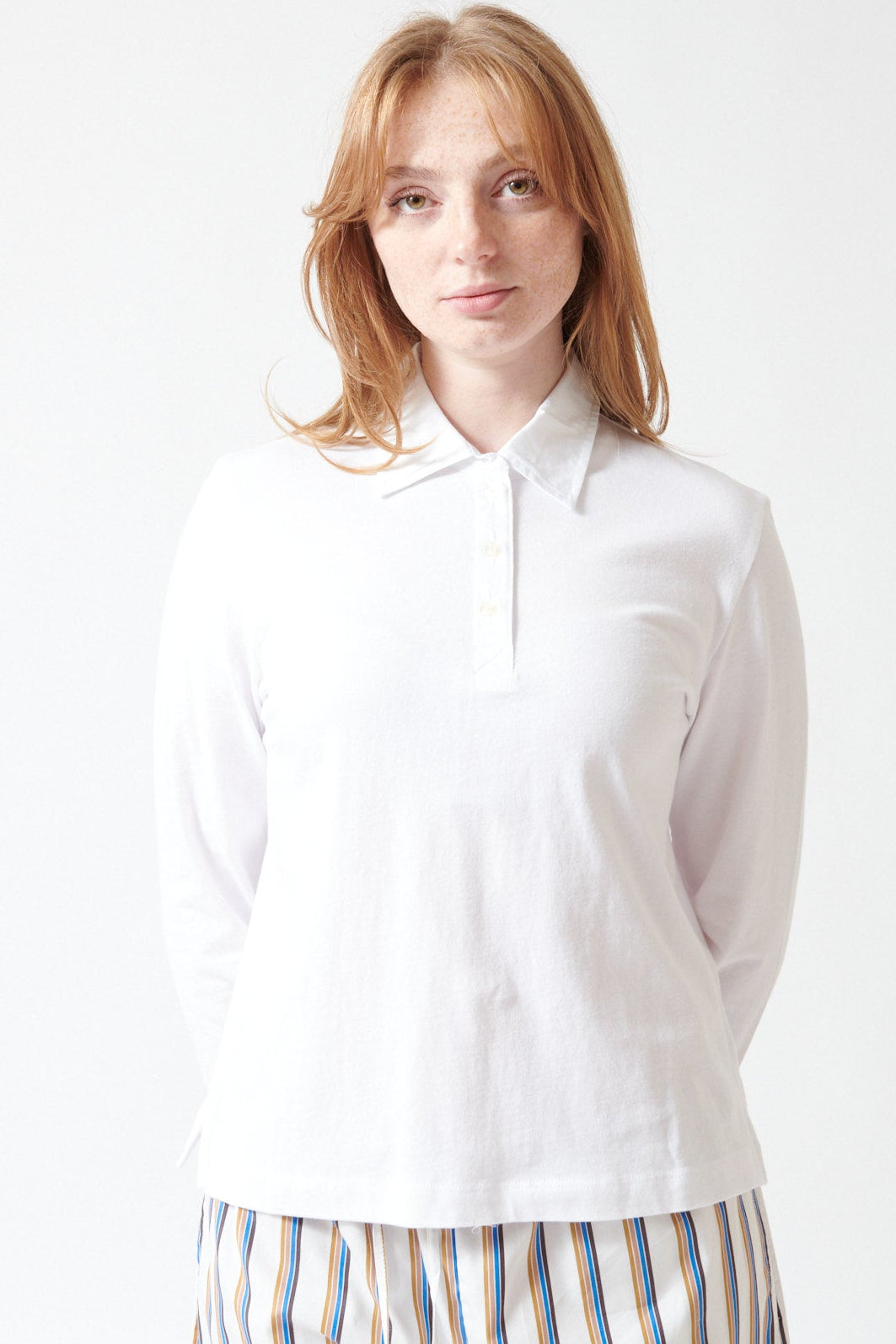 Waverly wearing LESET Margo Long Sleeve Polo front view