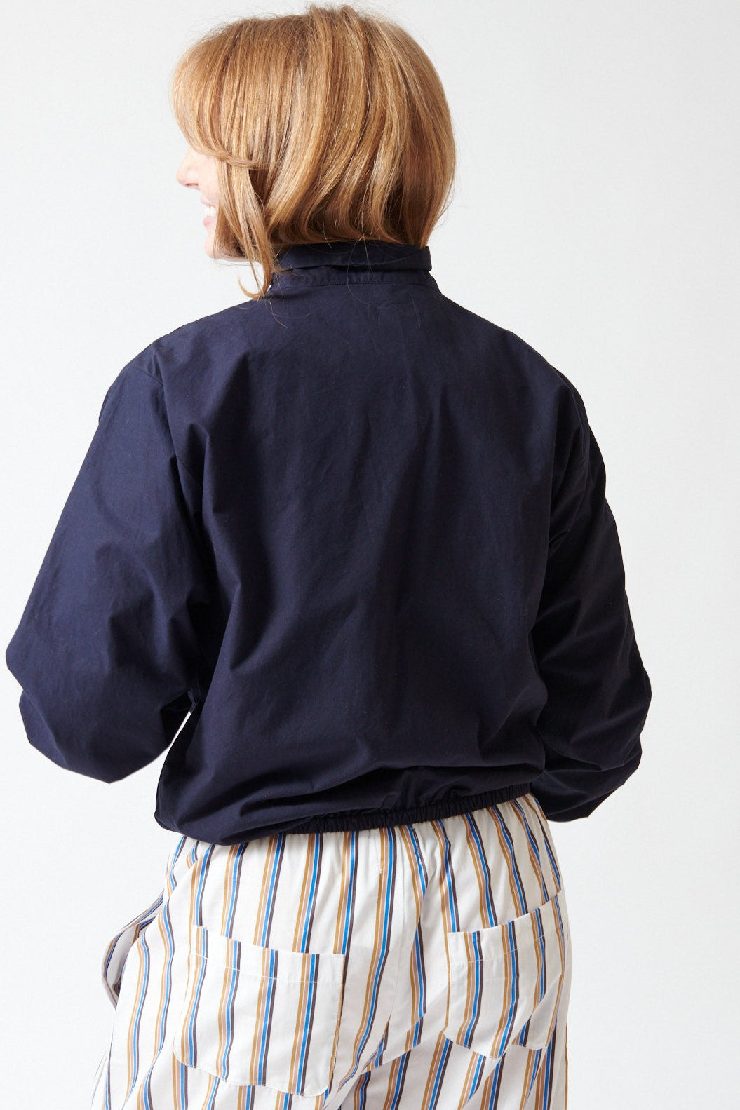 Waverly wearing LESET Kyoto Windbreaker rear view