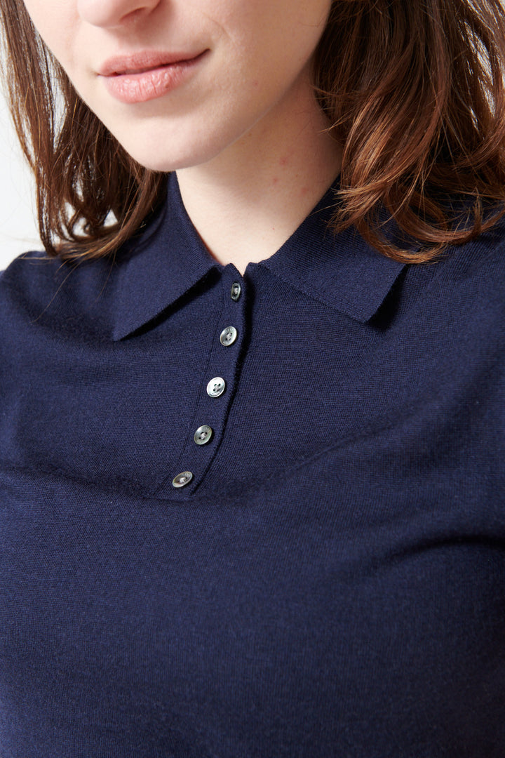 Sophie wearing LESET James Short Sleeve Polo front/detail view