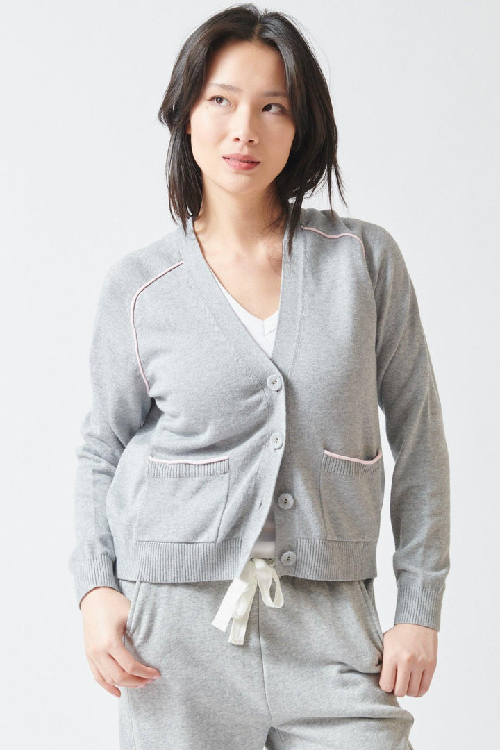 Lilly wearing Lilla P Saddle Sleeve V Neck Cardigan front view