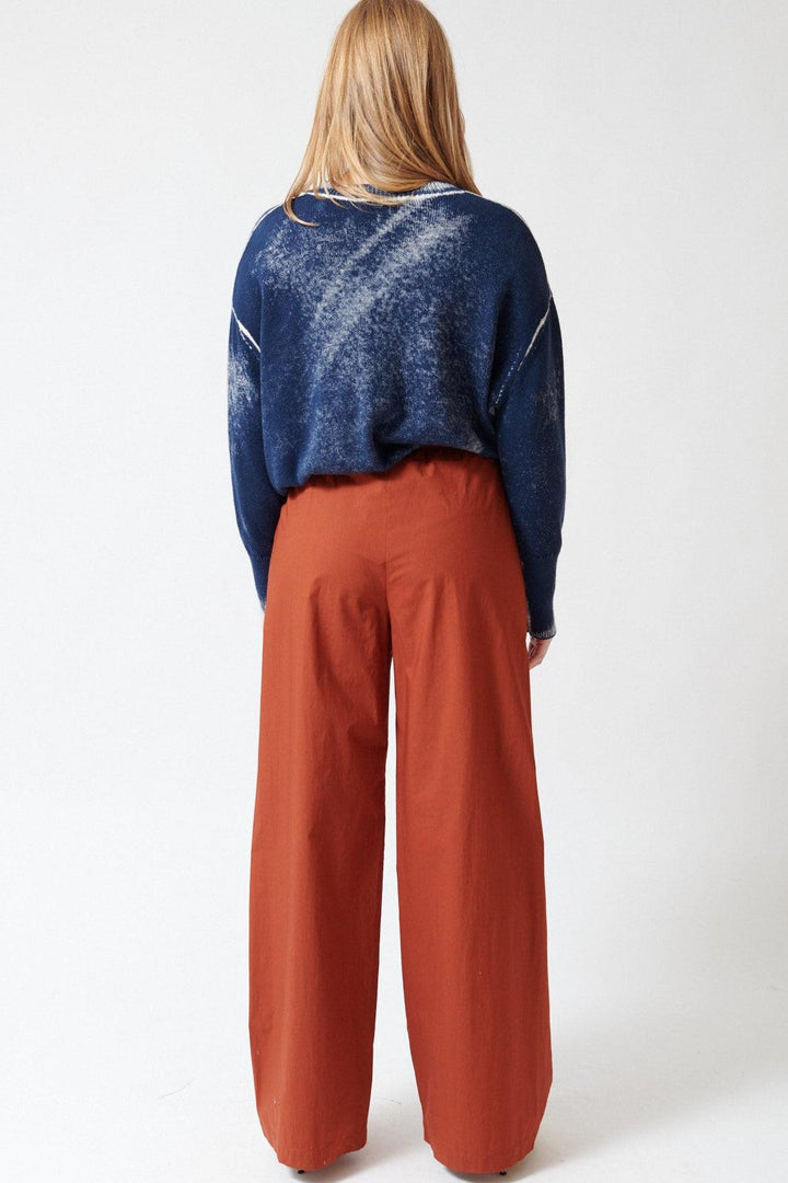 Waverly wearing Odeeh Cotton Poplin Single Pleat Pull On Pant rear view