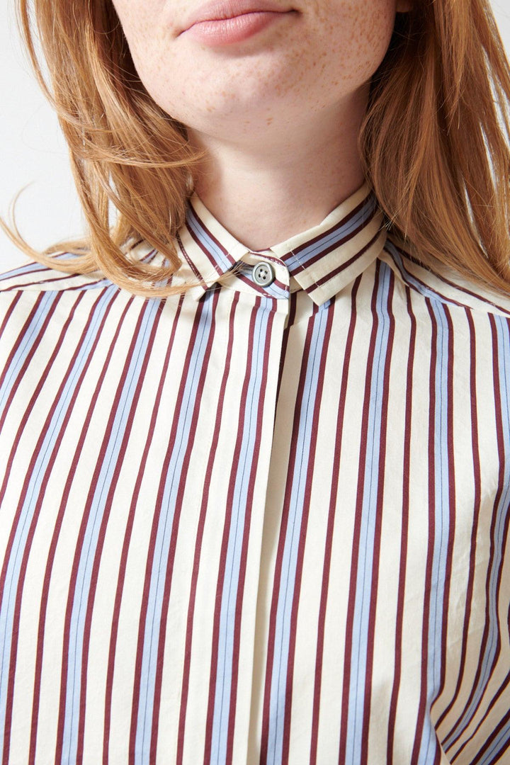 Waverly wearing Odeeh Fancy Stripe Shirt front/detail view