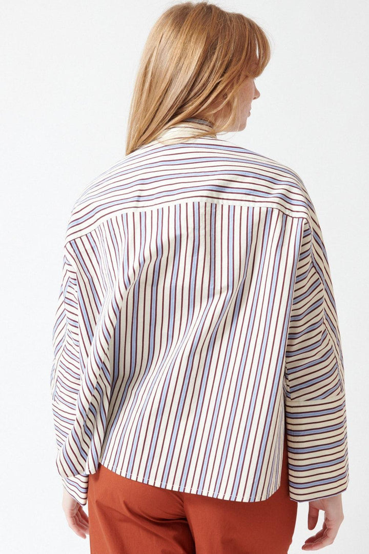 Waverly wearing Odeeh Fancy Stripe Shirt rear view