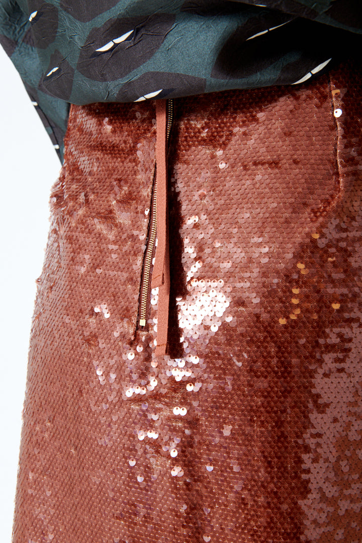 Mari wearing Odeeh Sequin Zip Back Skirt rear/detail view