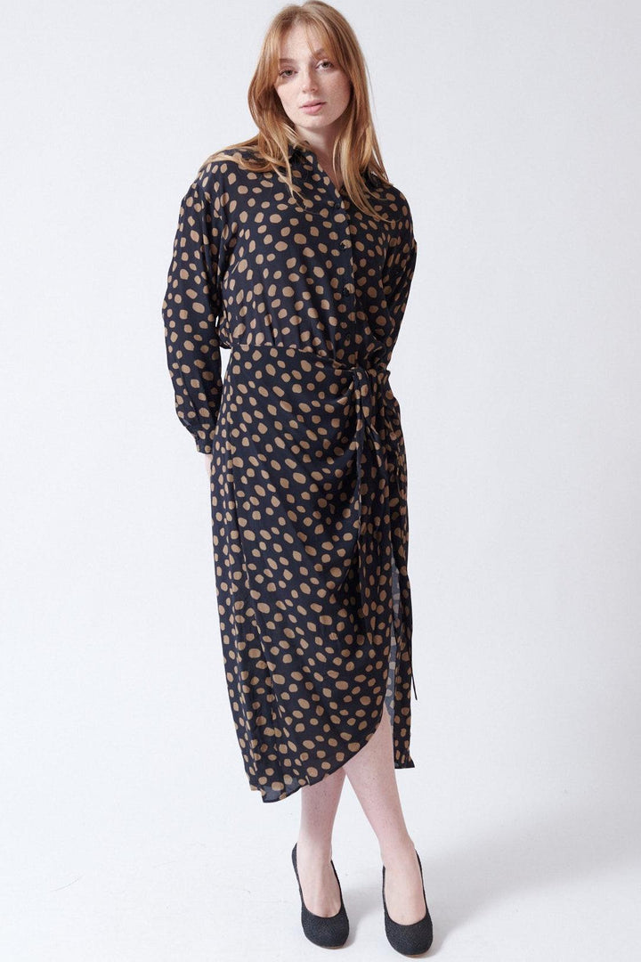Waverly wearing Apiece Apart Alessandra Sarong Shirt Dress front view