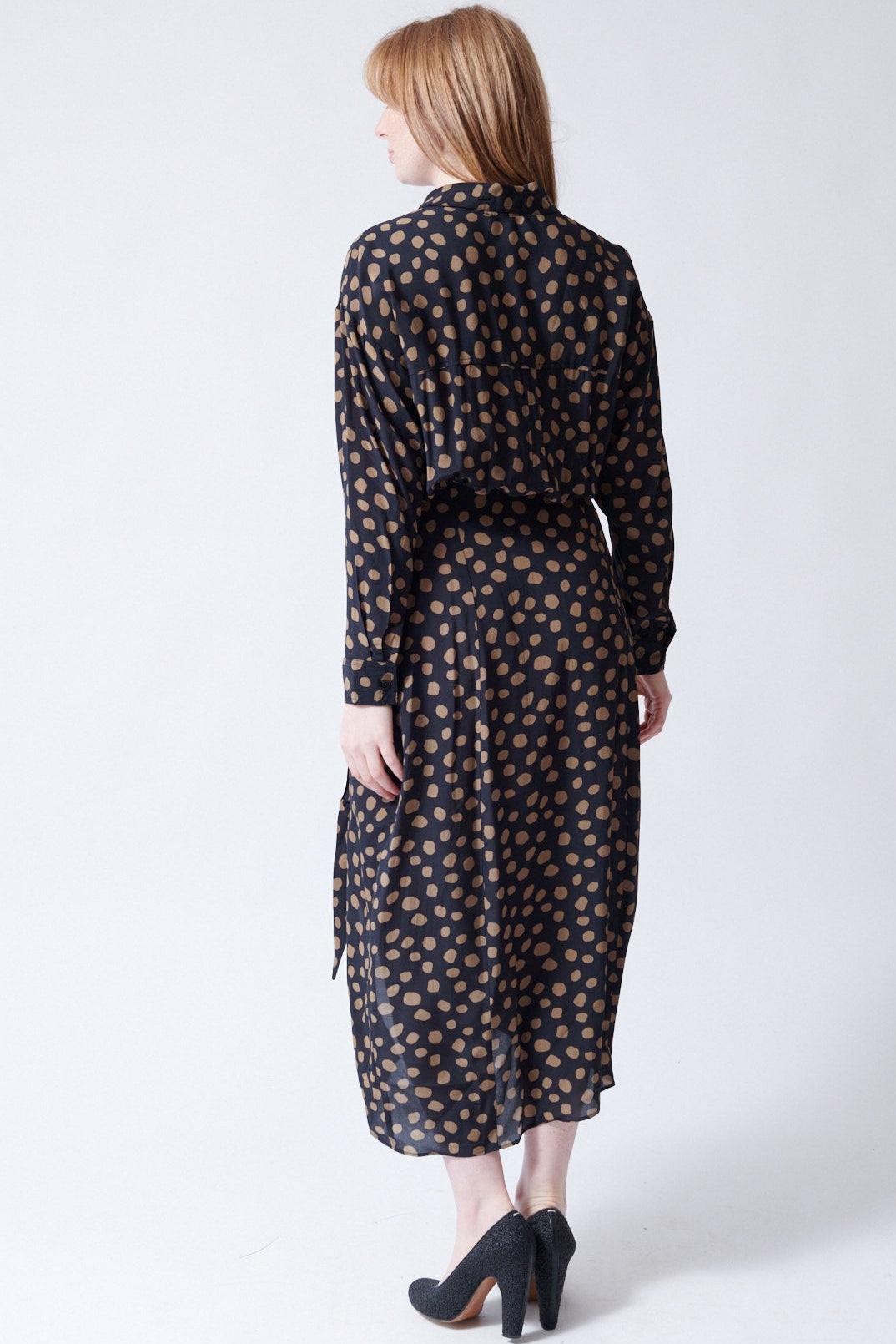 Waverly wearing Apiece Apart Alessandra Sarong Shirt Dress rear view