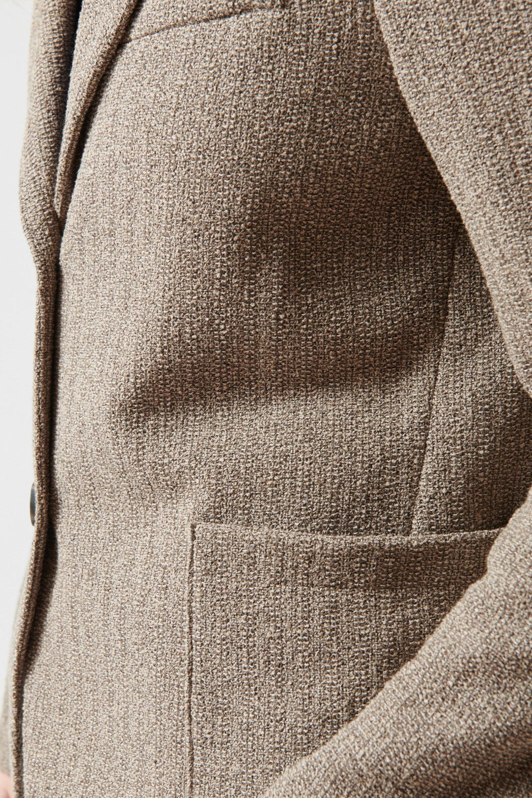 Madi wearing Harris Wharf Stand Up Collar Bicolour Frise Blazer detail view