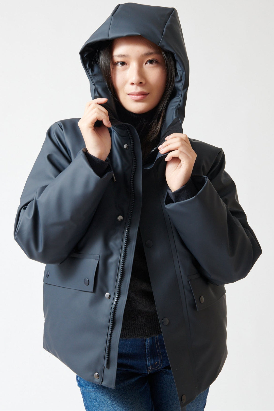 Lilly wearing Rains Nome Short W Parka front view