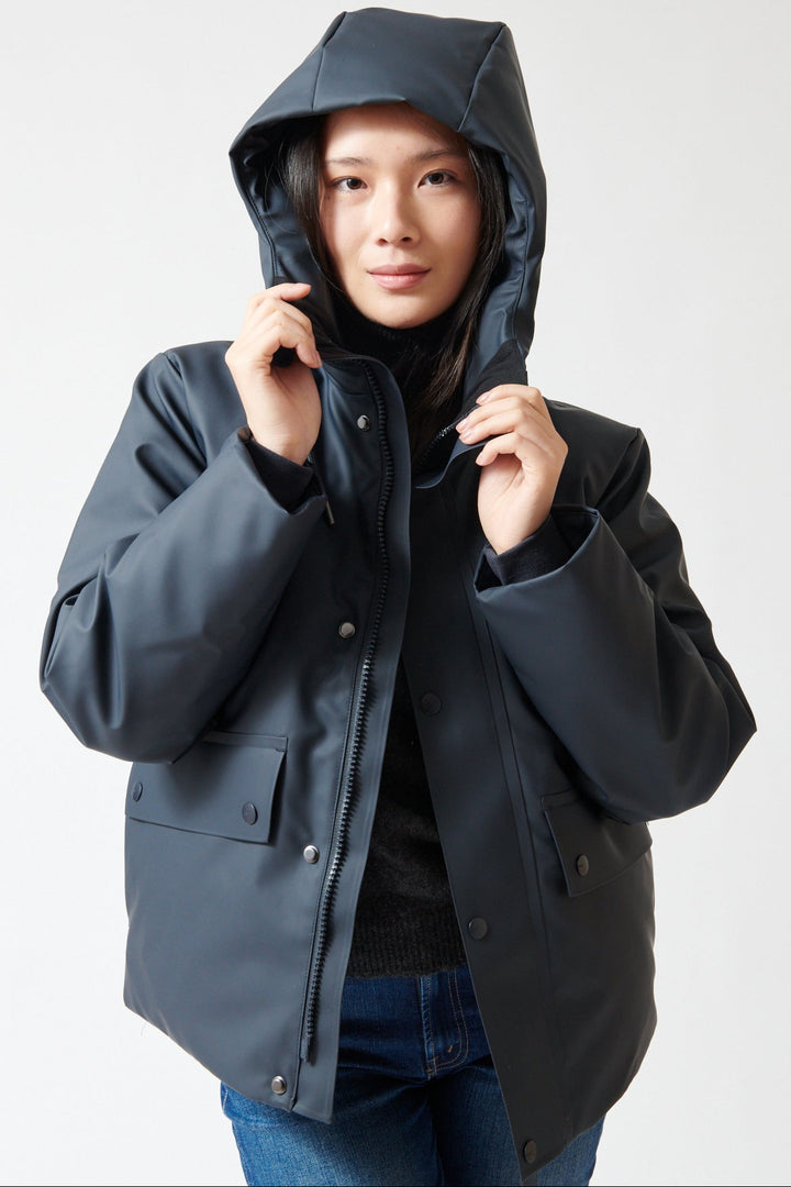 Lilly wearing Rains Nome Short W Parka front view