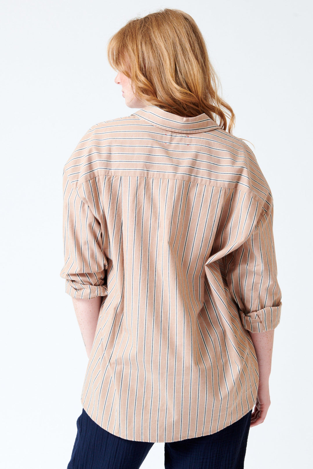 Waverly wearing Xirena Sydney Shirt rear view
