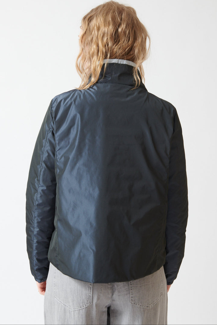 Madi wearing Herno Techno Taffeta Reverse To Quilted Shiny Nylon Short Jacket rear view