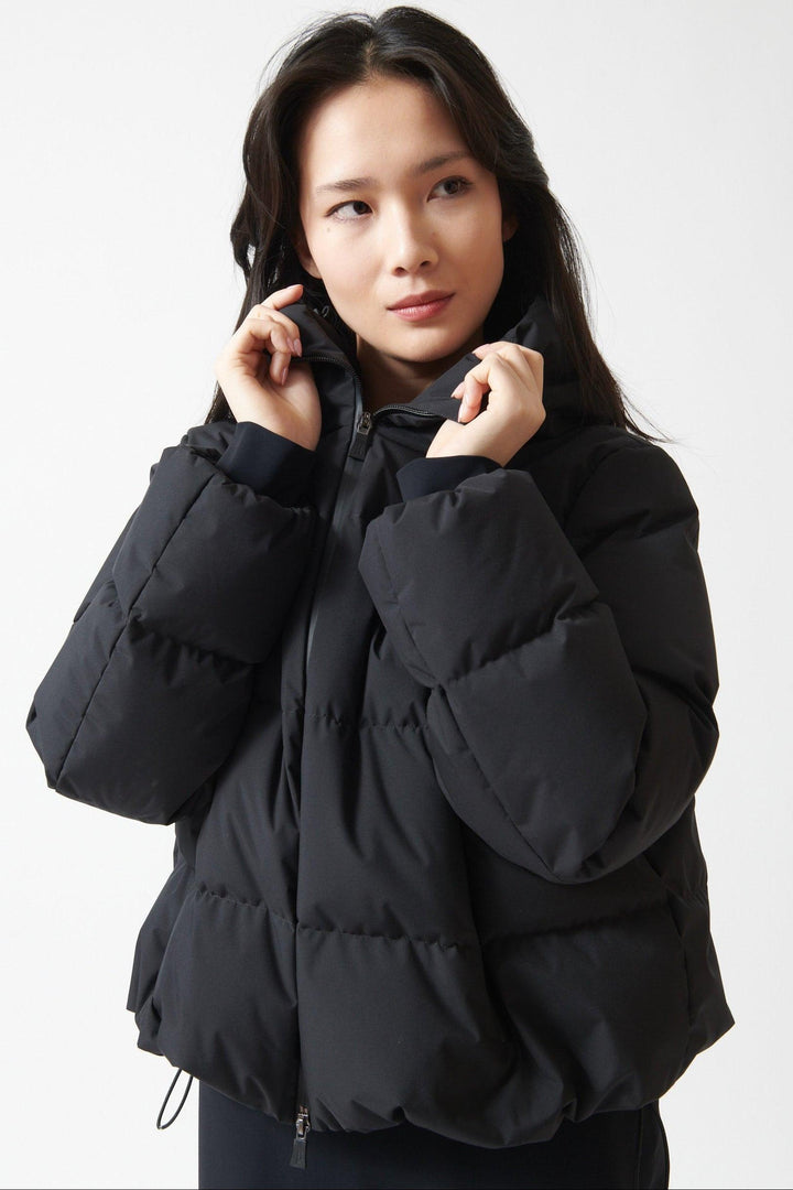 Lilly wearing Herno Short Hooded Puffer Coat front view