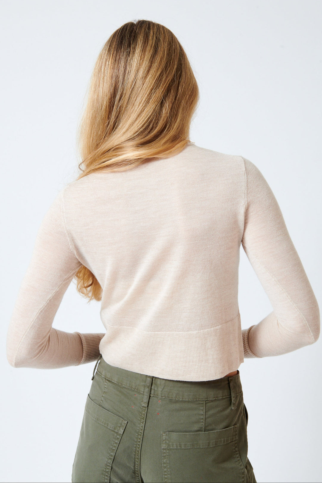 Mari wearing Xirena Kodiak Cardigan rear view
