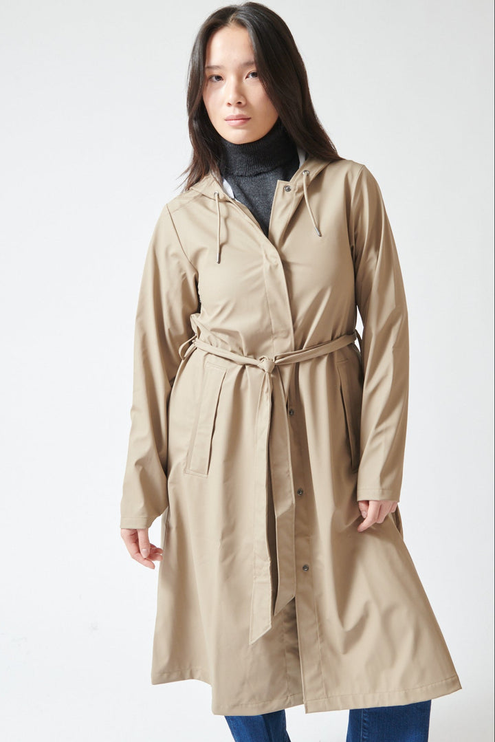 Lilly wearing Rains A-Line Longer W Jacket front view