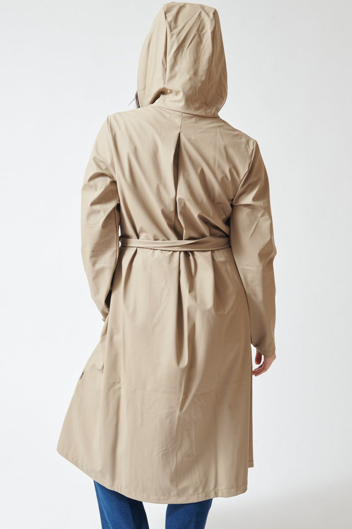 Lilly wearing Rains A-Line Longer W Jacket rear view