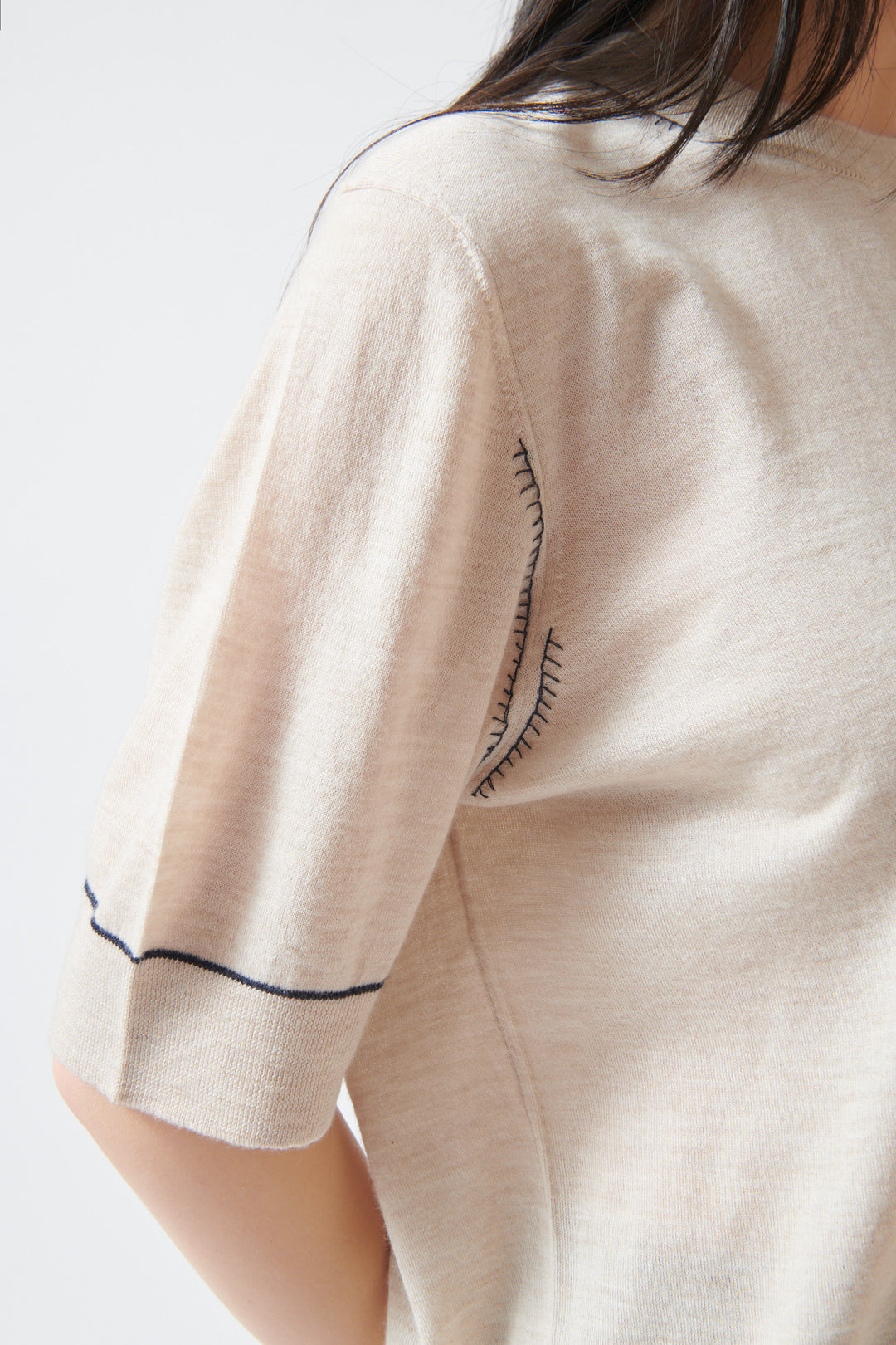 Lilly wearing Jumper 1234 Contrast Stitch Tee Shirt front/detail view