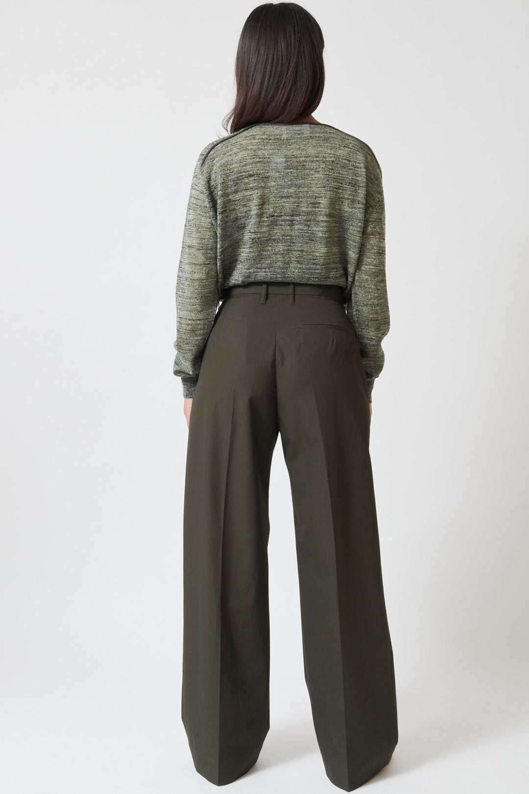 Model wearing Christian Wijnants Pama Cotton Wide Leg Trouser rear view