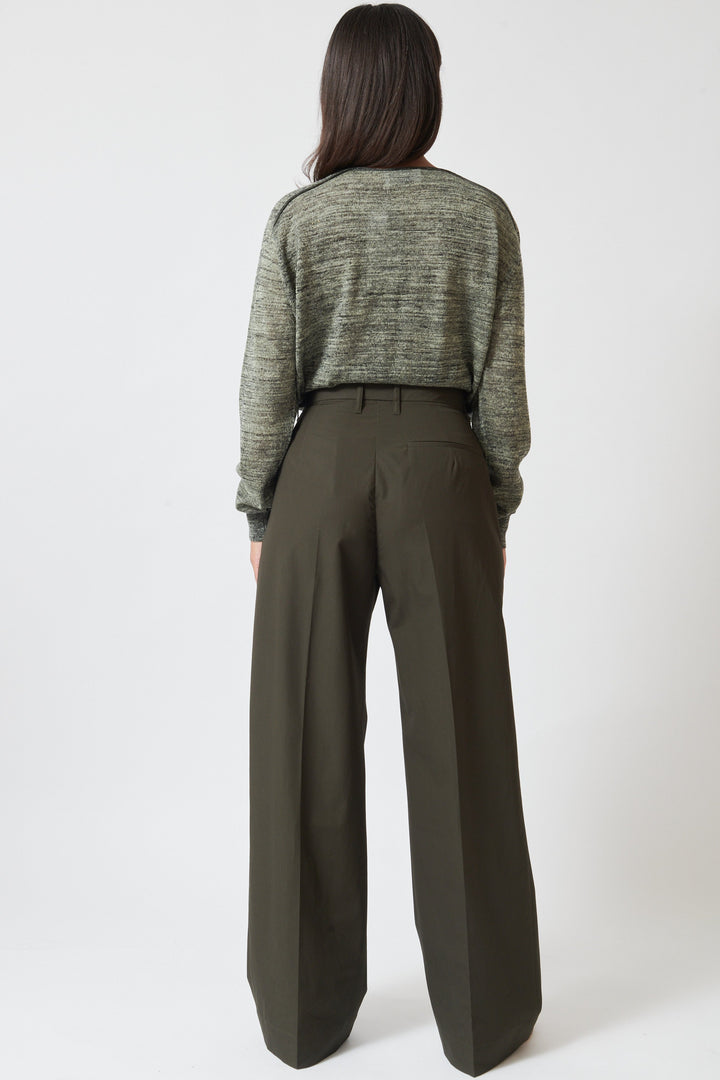Model wearing Christian Wijnants Pama Cotton Wide Leg Trouser rear view