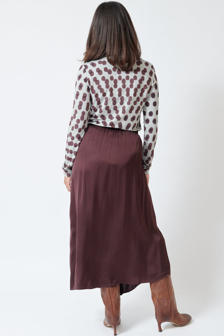 Model wearing Christian Wijnants Sedona Draped Skirt rear view