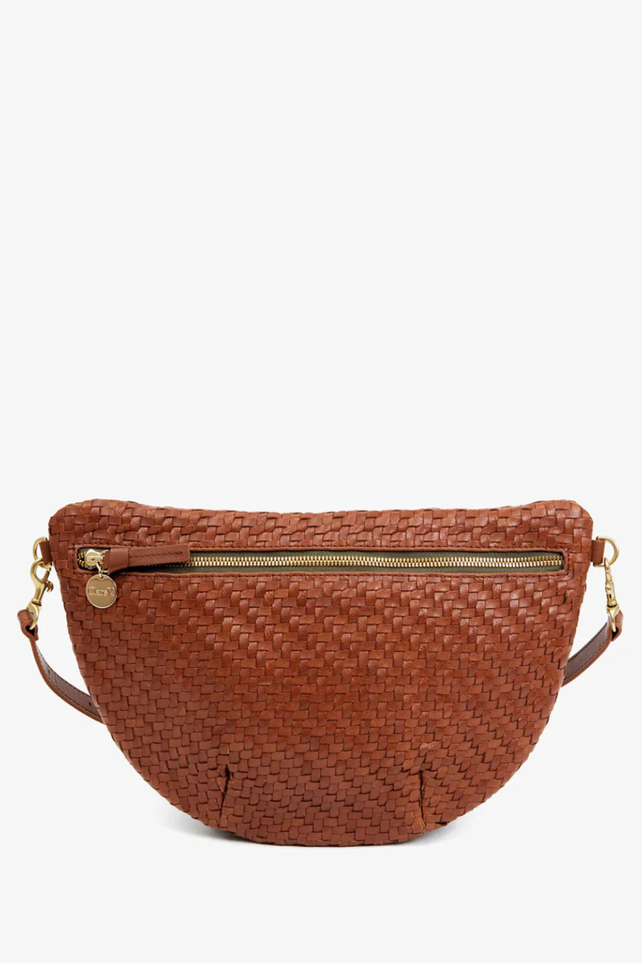 Flat lay of Clare V. Grande Fanny Hazelnut Woven Zig Zag front view