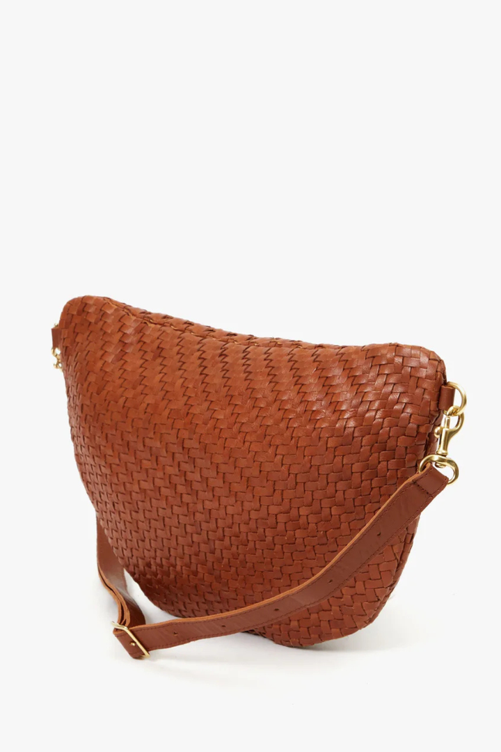 Flat lay of Clare V. Grande Fanny Hazelnut Woven Zig Zag rear view