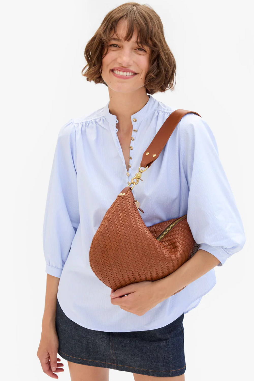 Model wearing Clare V. Moyen Messenger Hazelnut Woven Zig Zag front view