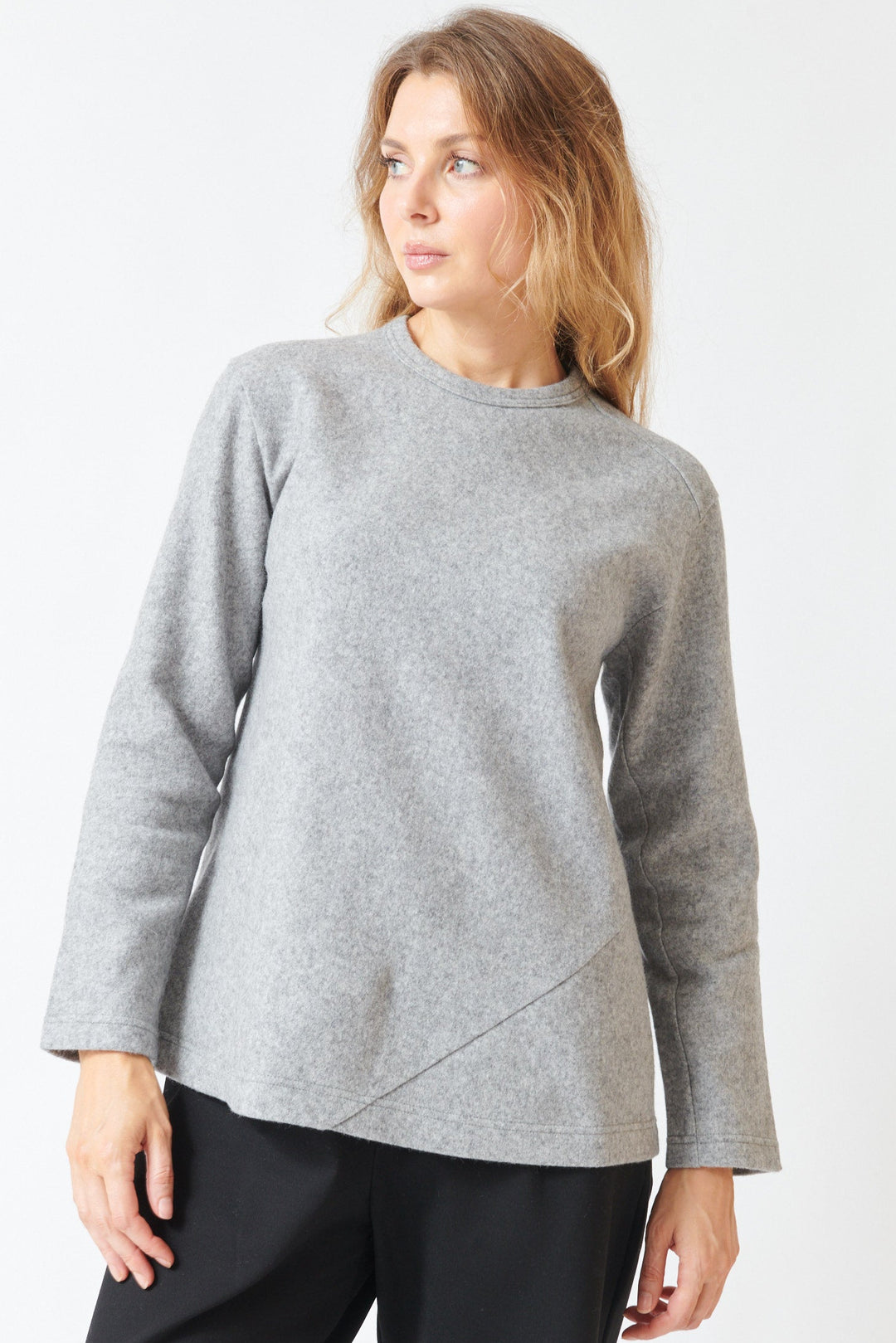 Mari wearing Comme des Garçons Wool Blend Diagonal Seam Long Sleeve Tee Light Grey front view