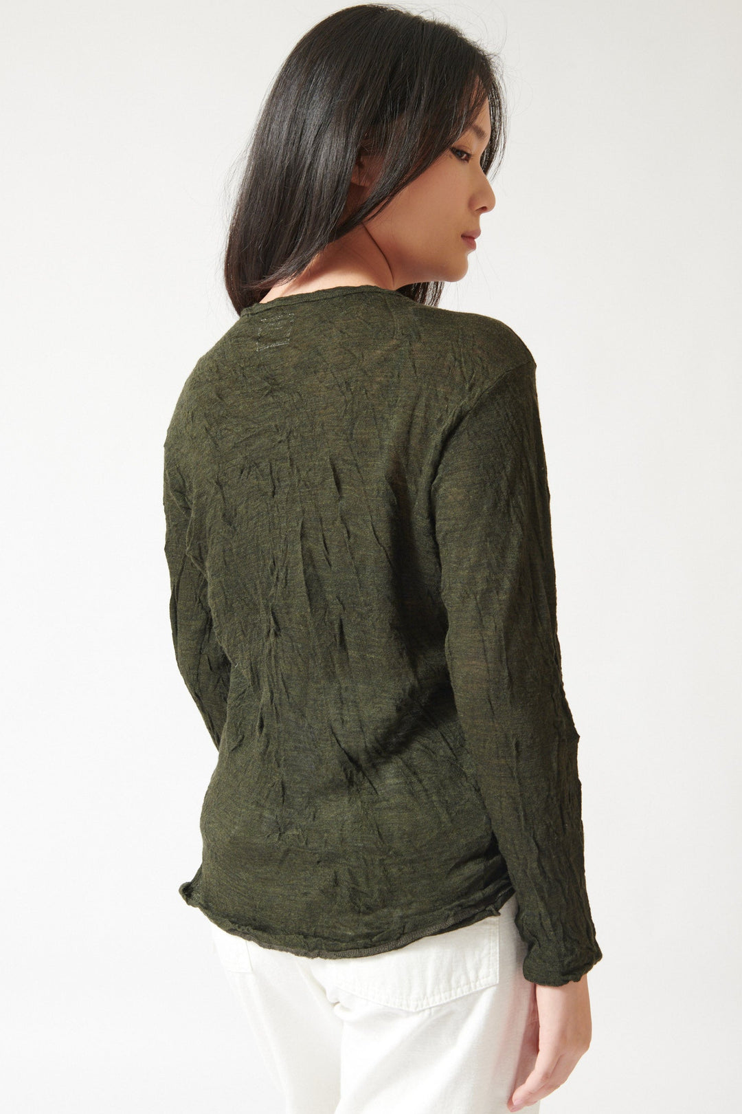 Lilly wearing Pas de Calais Crinkle Finish Wool Gauze Jersey Crewneck Pullover Khaki rear view