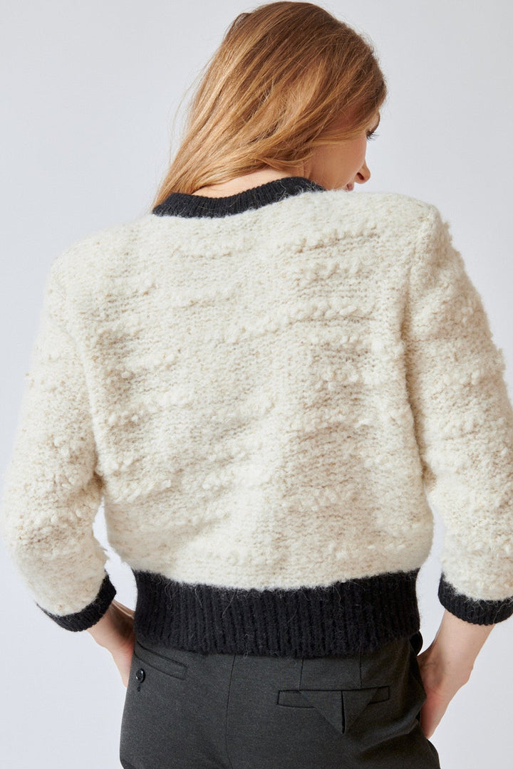 Mari wearing Dorothee Schumacher Delightful Sparkle Cardigan rear view