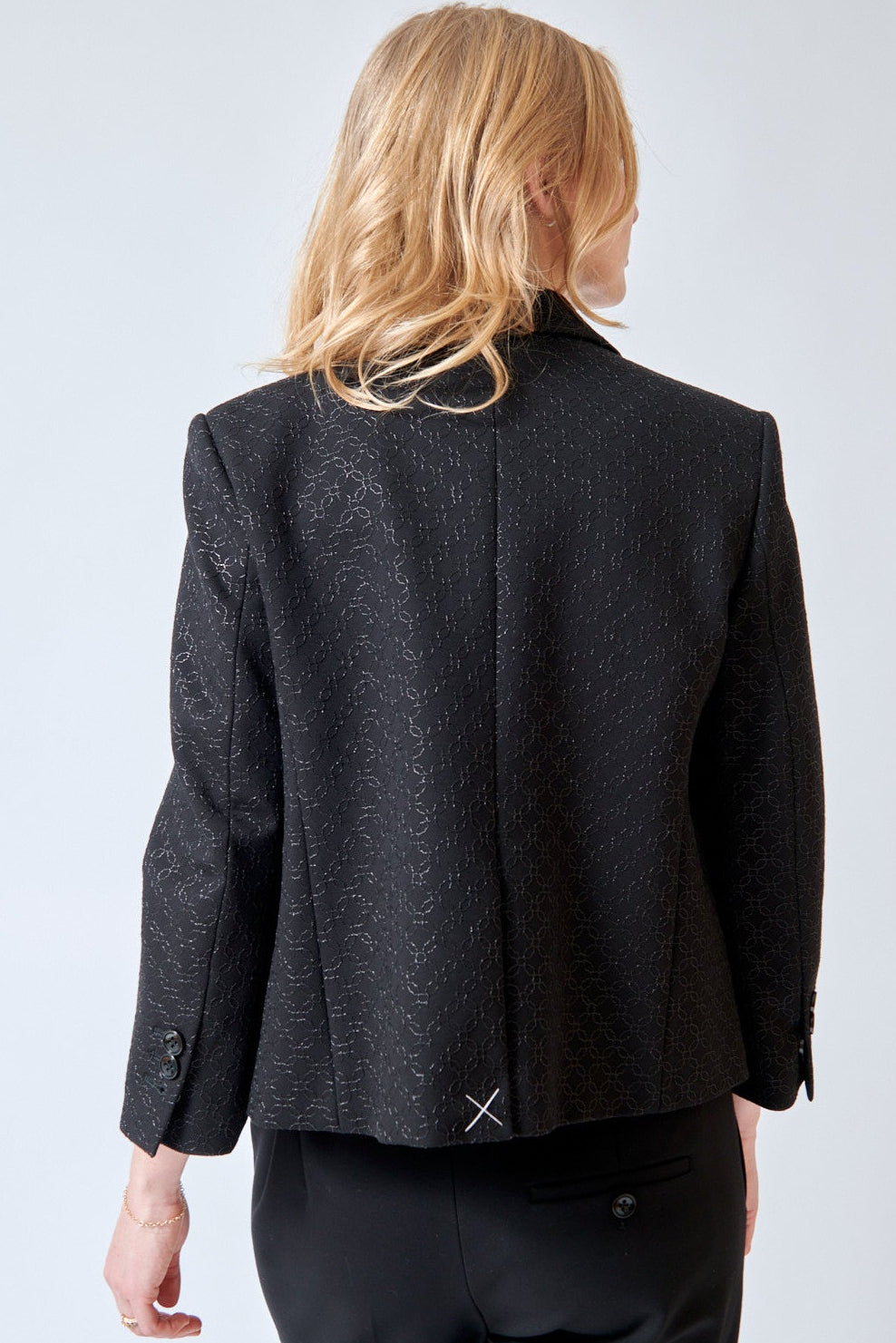 Madi wearing Dorothee Schumacher Sparkling Emotions Jacket rear view