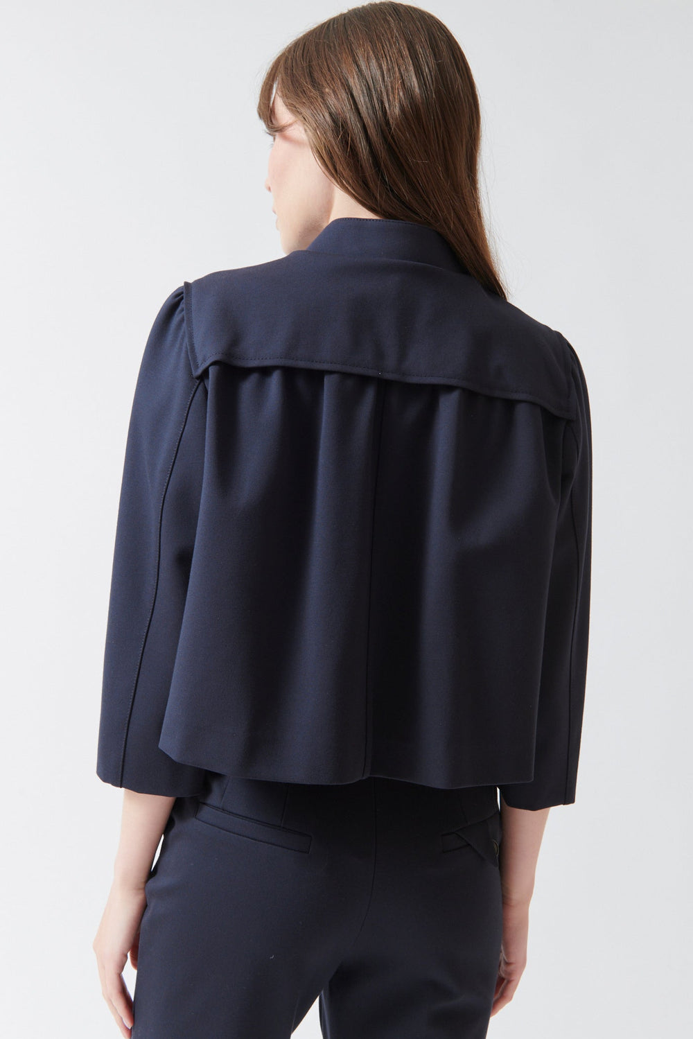 Angela wearing Dorothee Schumacher Emotional Essence Jacket rear view