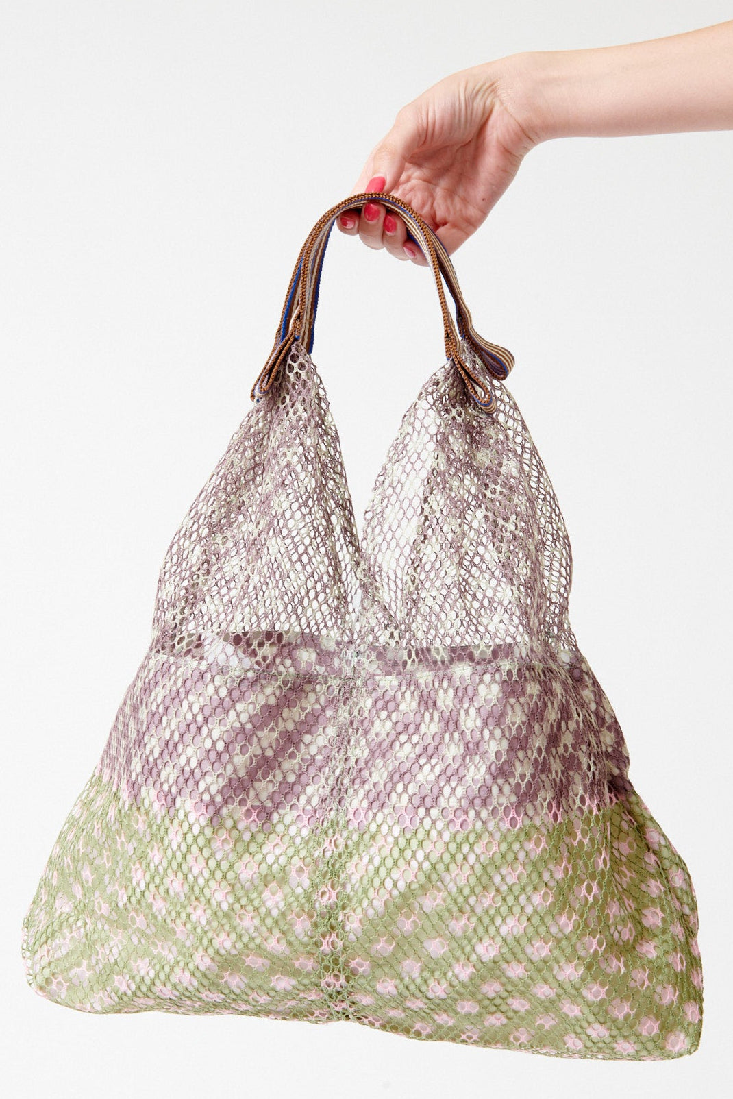 Model holding Épice Elziver Bag With Removable Purse Moss front view