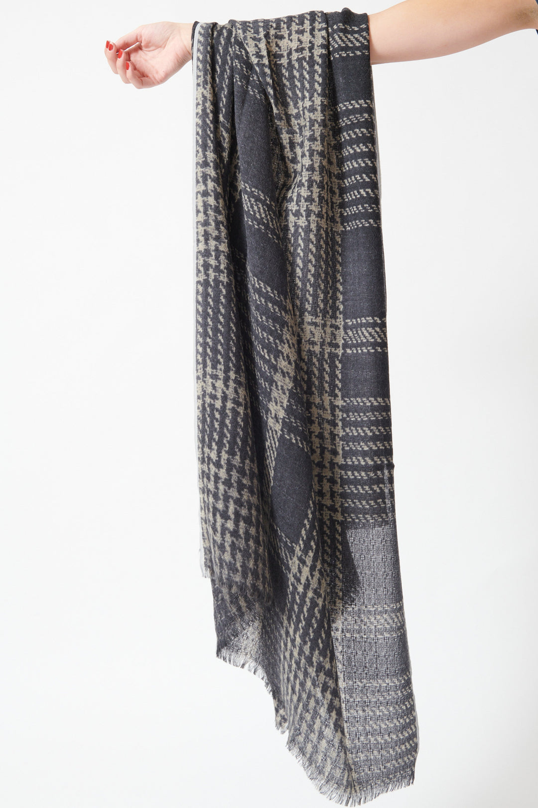 Model holding Épice Tweed Check 1 Shawl front view