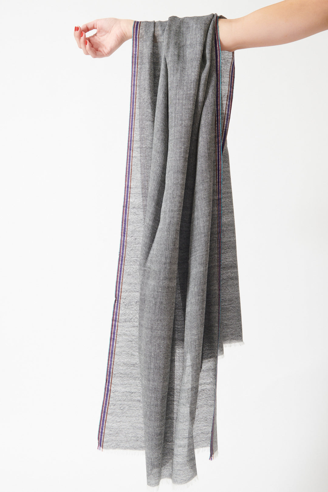 Model holding Épice Uni 3 Stole front view