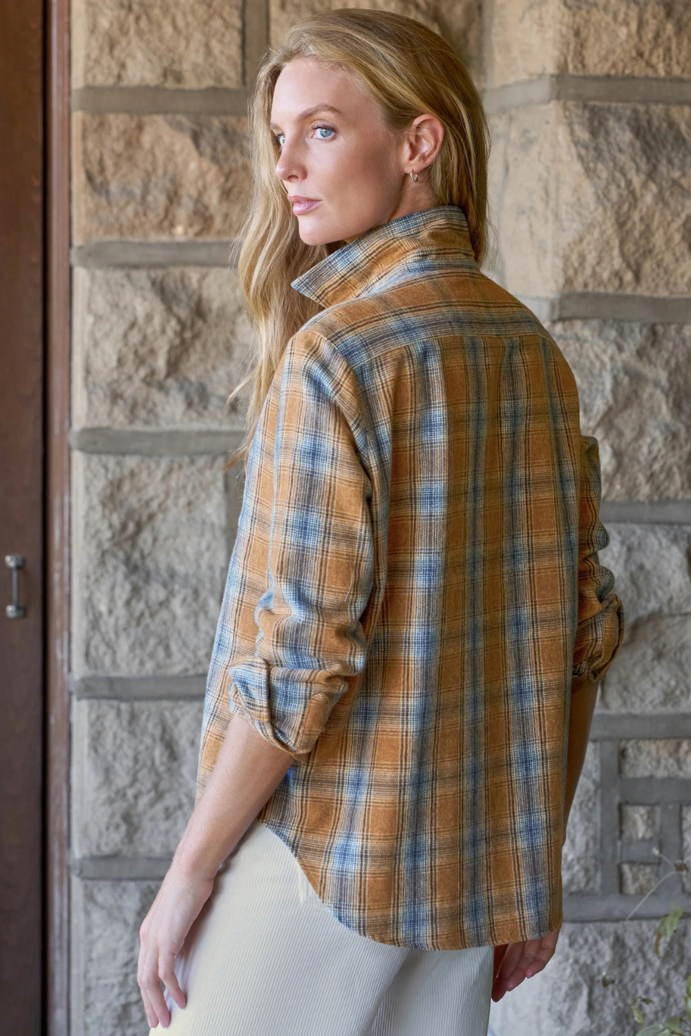 Model wearing Frank & Eileen Silvio Untuckable Button Up Shirt Gold Blue Large Plaid rear view