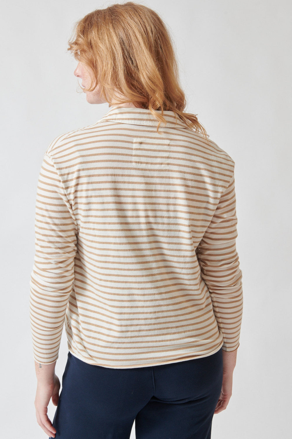 Waverly wearing Frank & Eileen Patrick Popover Henley Top Vintage White And Camel Stripe rear view