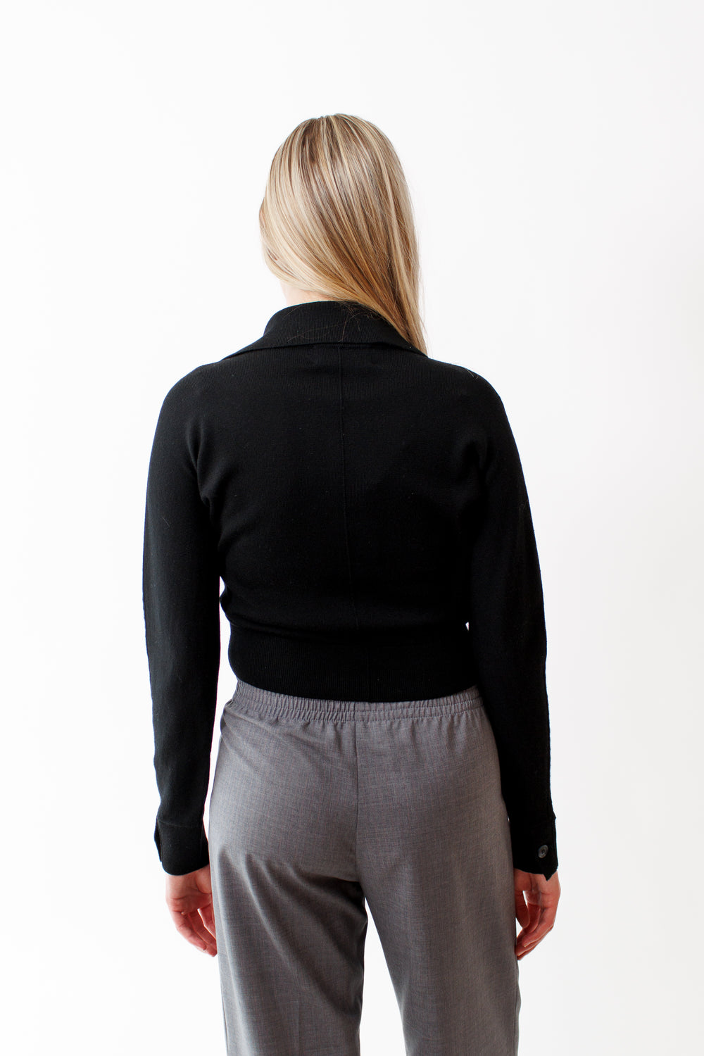 Bailey wearing WE-AR4 The Social Cardigan rear view